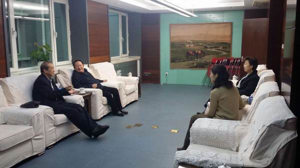 1自治区残联党组书记理事长周俊林陪同 与中国残联.jpg